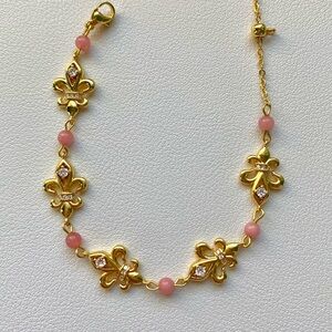 Elegant Gold and Pink Bracelet